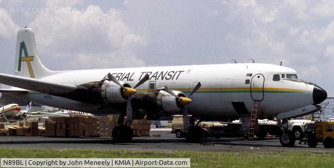 N89BL, 1957 Douglas DC-6A C/N 45374, Waiting for another load of freight. July 1990.