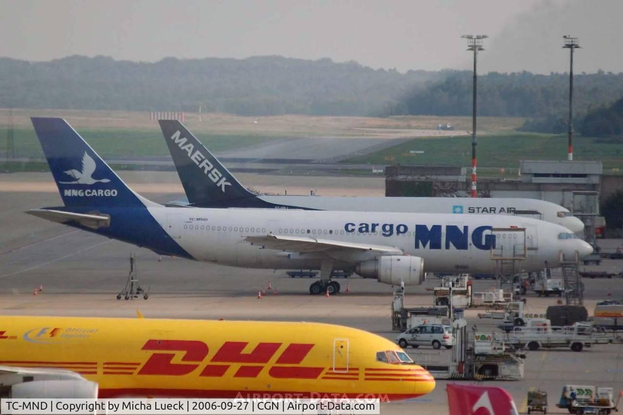 TC-MND, 1982 Airbus A300C4-203F C/N 212, MNG Cargo at Cologne/Bonn. In front is DHL B757 OO-DPN