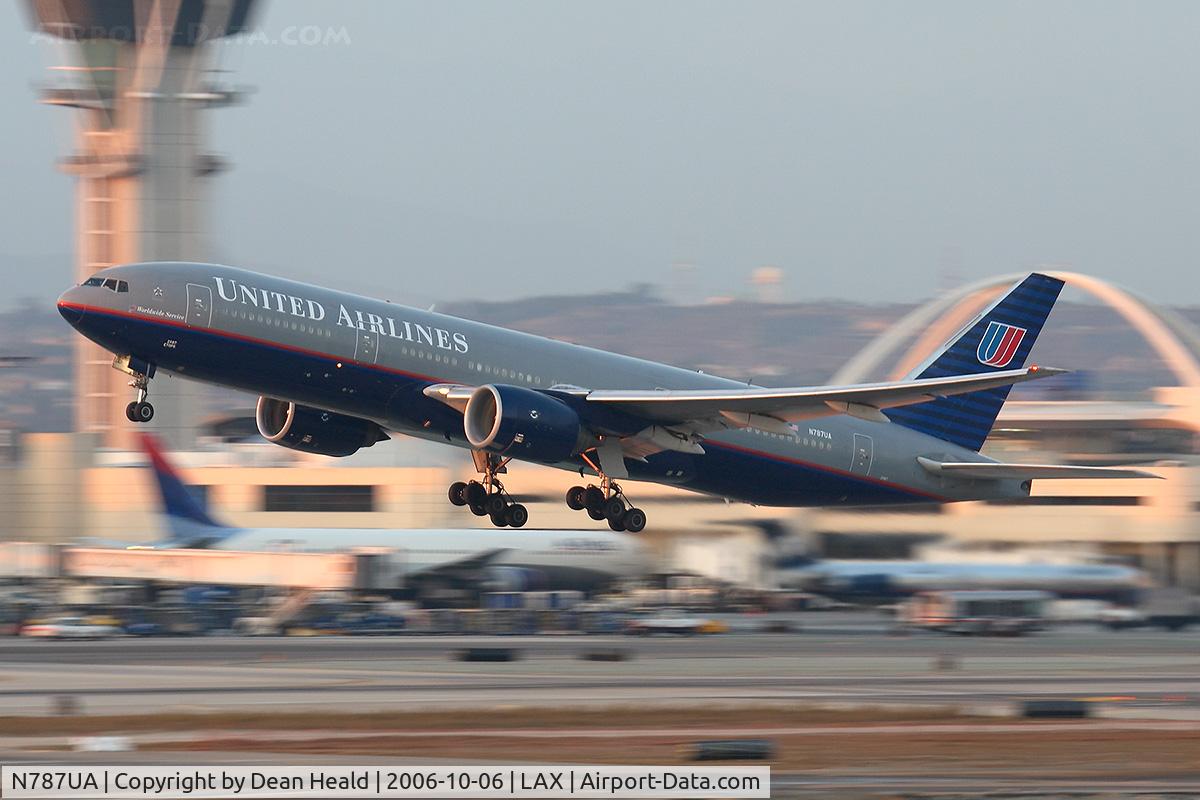 N787UA, 1997 Boeing 777-222 C/N 26939, United Airlines N787UA (FLT UAL934) departing RWY 25R enroute to London Heathrow (EGLL) a few minutes before sunset.