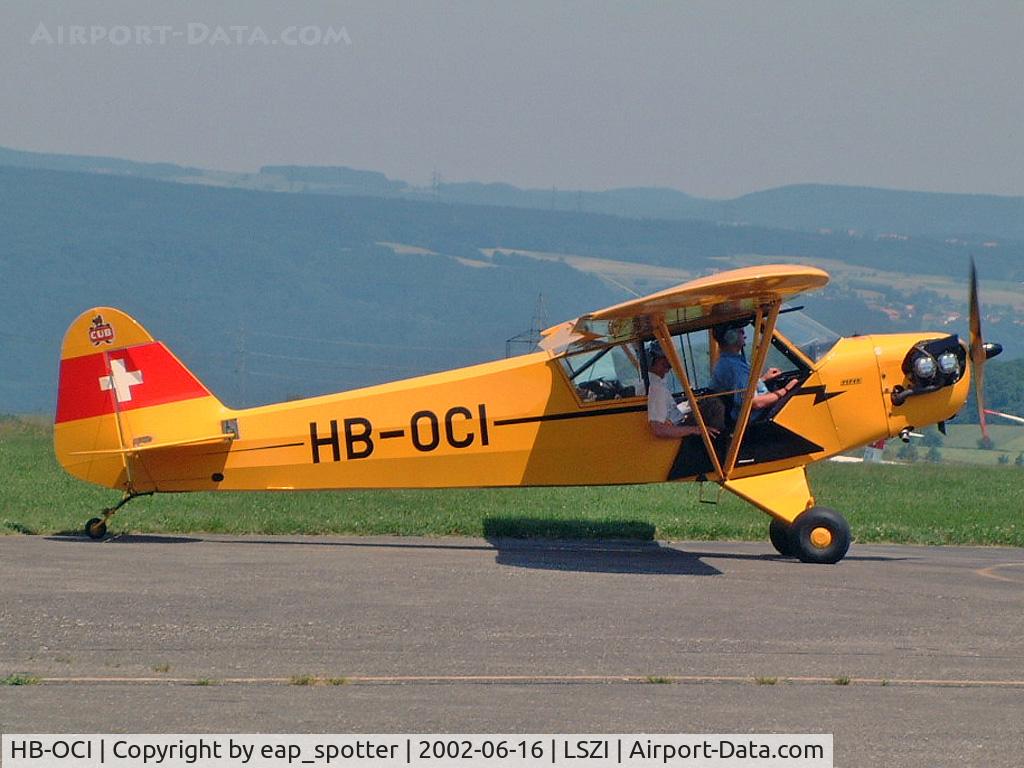 HB-OCI, 1944 Piper L-4J Grasshopper (J3C-65D) C/N 12534, taxiing to fuelstation