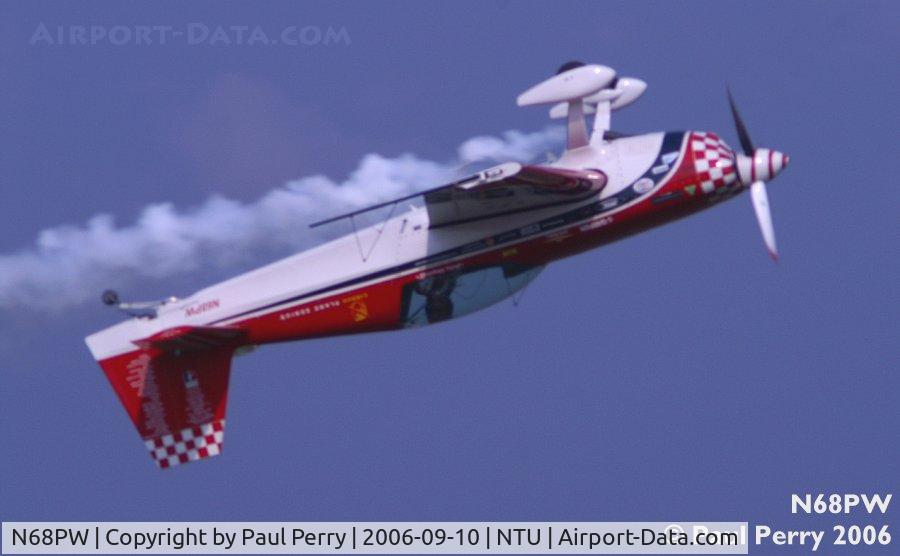 N68PW, Extra EA-300S C/N 030, Patty hanging by her straps during an inverted pass