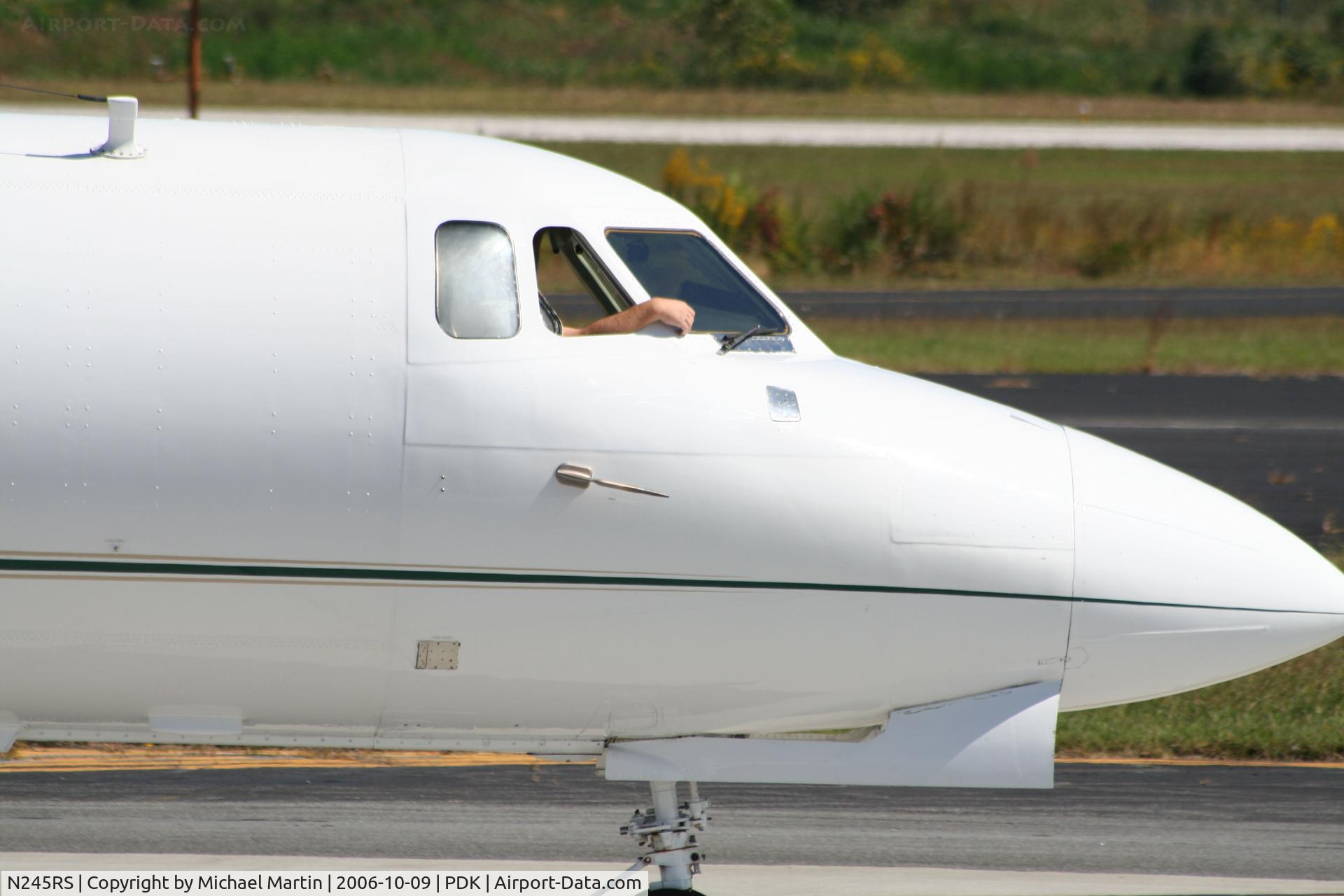 N245RS, 1973 Hawker Siddeley HS.125 Series 600A C/N 256027, Hope he remembers to put up the window on take-off!