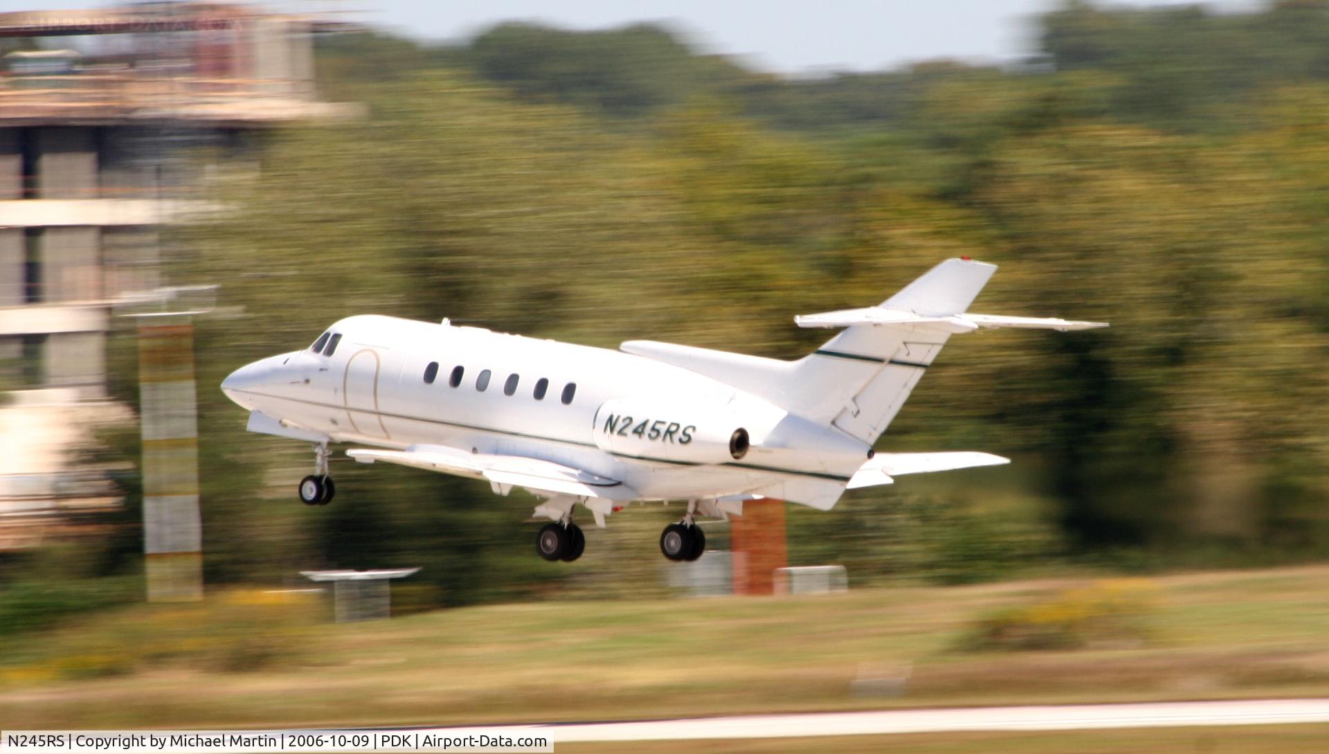 N245RS, 1973 Hawker Siddeley HS.125 Series 600A C/N 256027, Departing PDK enroute to ADS