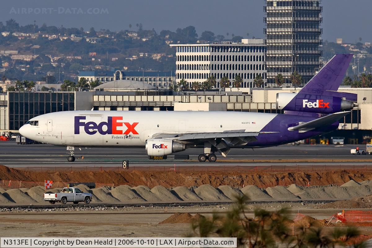 N313FE, 1988 McDonnell Douglas DC-10-30F C/N 48311, Fed Ex N313FE (FLT FDX3706) exitting RWY 25R after arrival from Indianapolis Int'l (KIND). [Canon 30D, Canon 300mm f/2.8L IS]