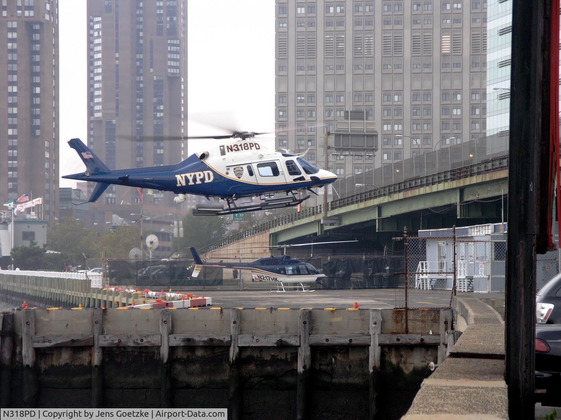 N318PD, 2004 Agusta A-119 C/N 14039, final approach at Heliport East 33rd Street / NY