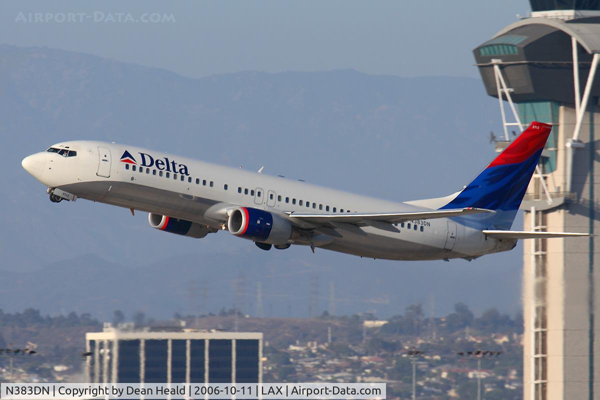 N383DN, 1999 Boeing 737-832 C/N 30346, Delta Airlines N383DN (FLT DAL1426) on a shallow climbout from RWY 25R enroute to Hartsfield Jackson Atlanta Int'l (KATL).