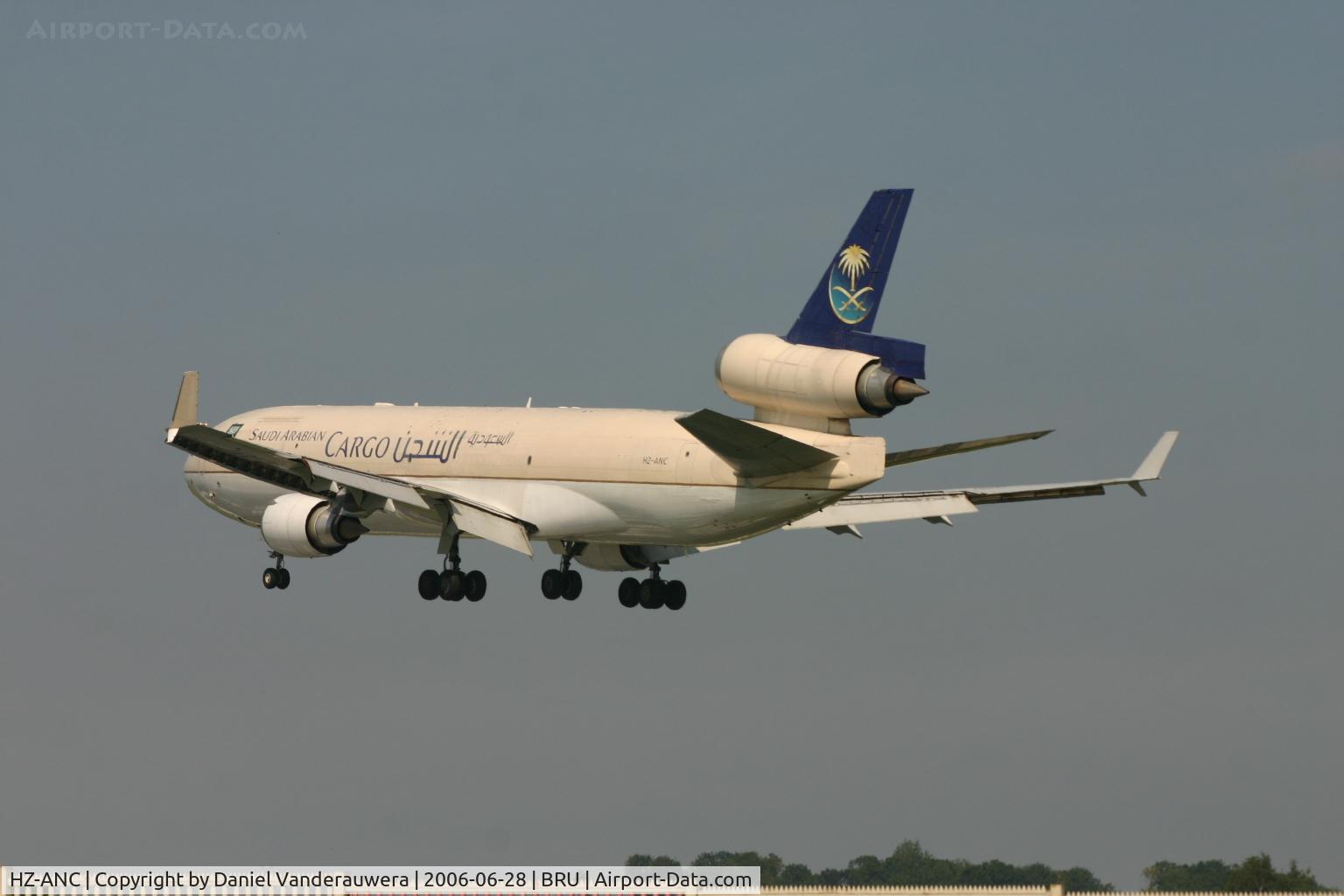 HZ-ANC, 1997 McDonnell Douglas MD-11F C/N 48776, short to touch rwy 25L