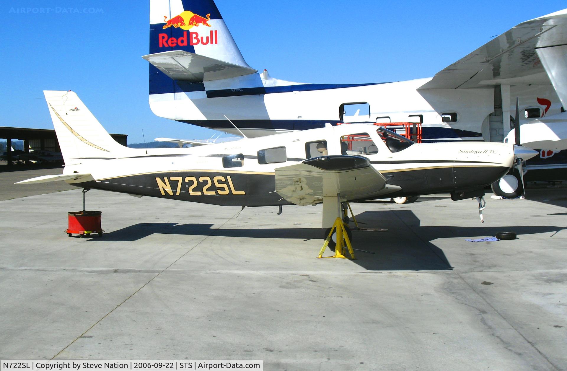 N722SL, Raytheon Aircraft Company G36 C/N E-3722, Leopard & Co. 2002 Piper PA-32R-301T on jacks @ Sonoma County Airport (Santa Rosa), CA