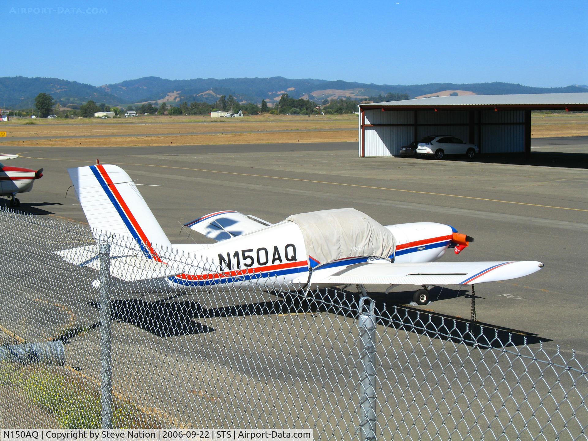 N150AQ, 1994 PZL-Okecie PZL-110 Koliber 150A C/N 04940067, Hiding over the fence is NB Air 1994 Koliber PZL-150 @ Sonoma County Airport (Santa Rosa), CA