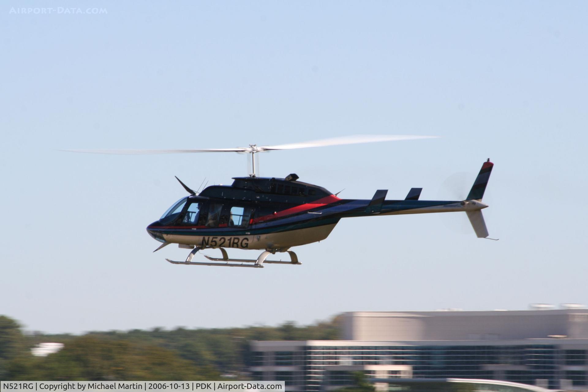 N521RG, 1992 Bell 206L-3 LongRanger III C/N 51566, Preparing to land at Signature Flight Services