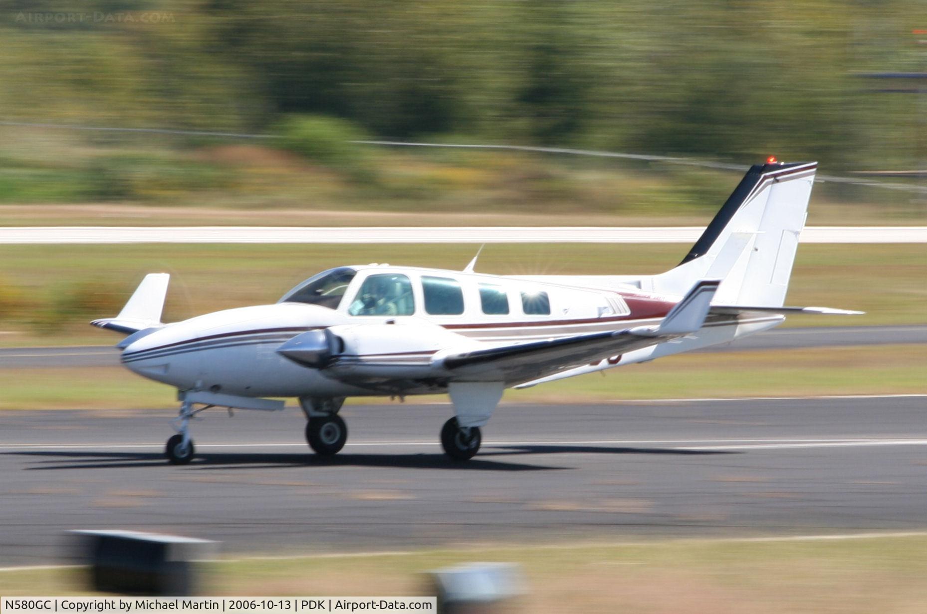 N580GC, 1984 Beech 58 Baron C/N TH-1436, Departing PDK enroute to TBR
