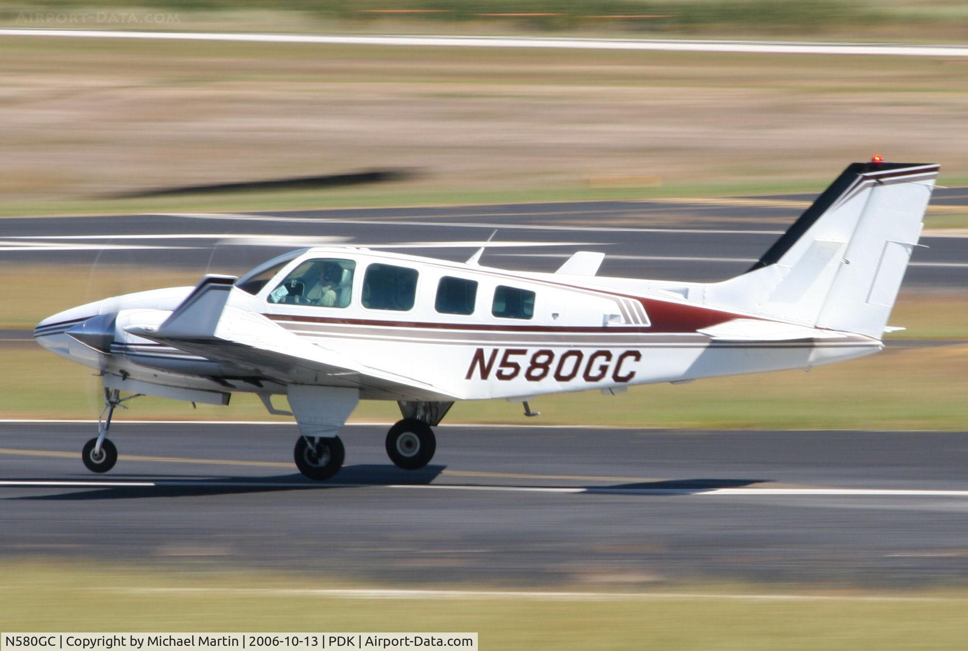 N580GC, 1984 Beech 58 Baron C/N TH-1436, Departing PDK enroute to TBR