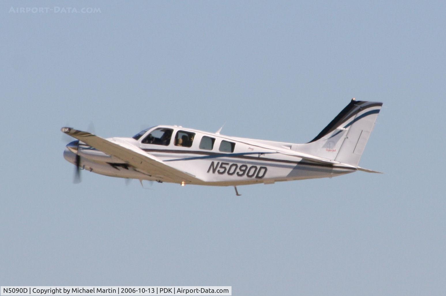 N5090D, Raytheon Aircraft Company 58 C/N TH-2090, Departing PDK enroute to BCT