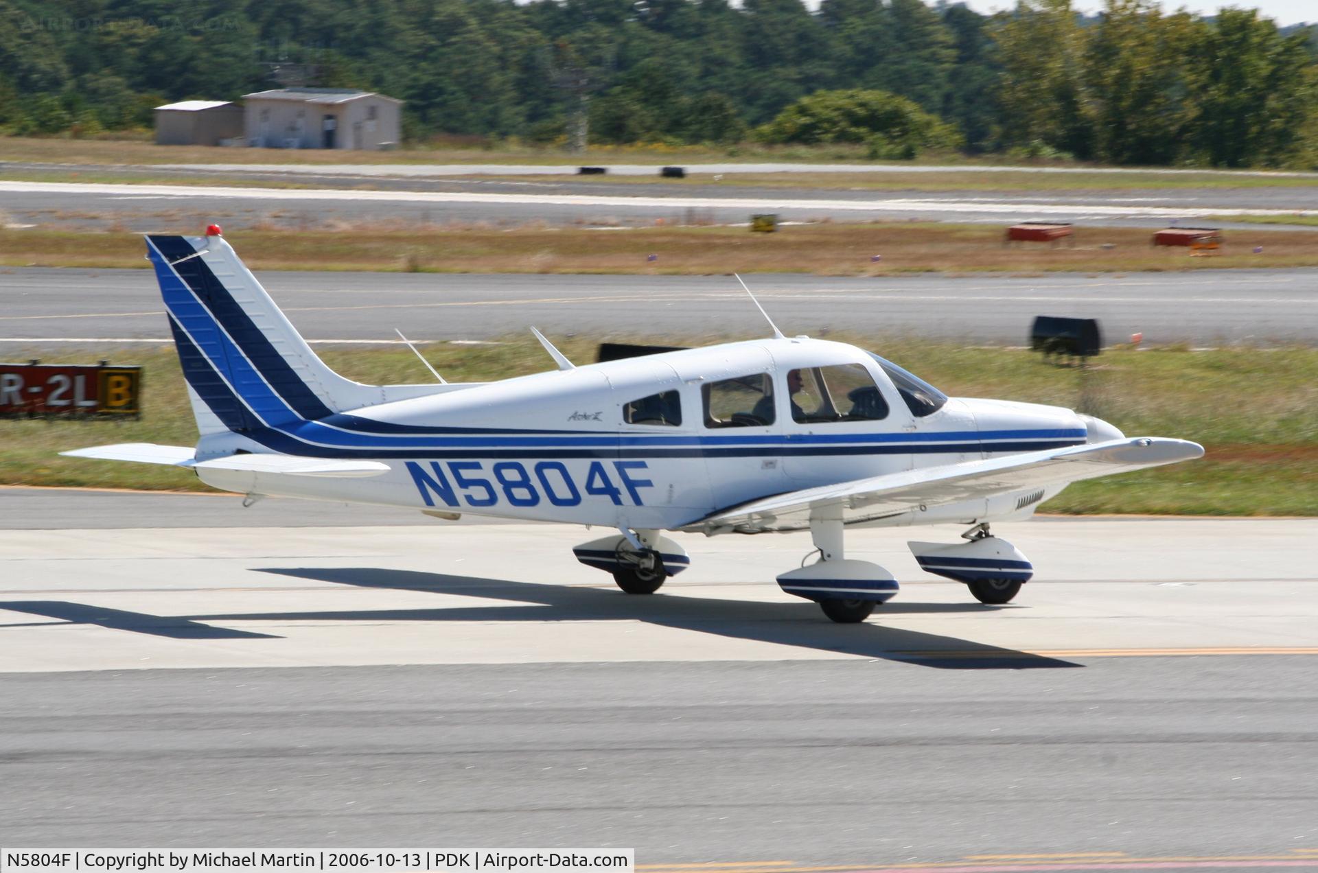 N5804F, 1976 Piper PA-28-181 C/N 28-7790134, Taxing to Runway 34