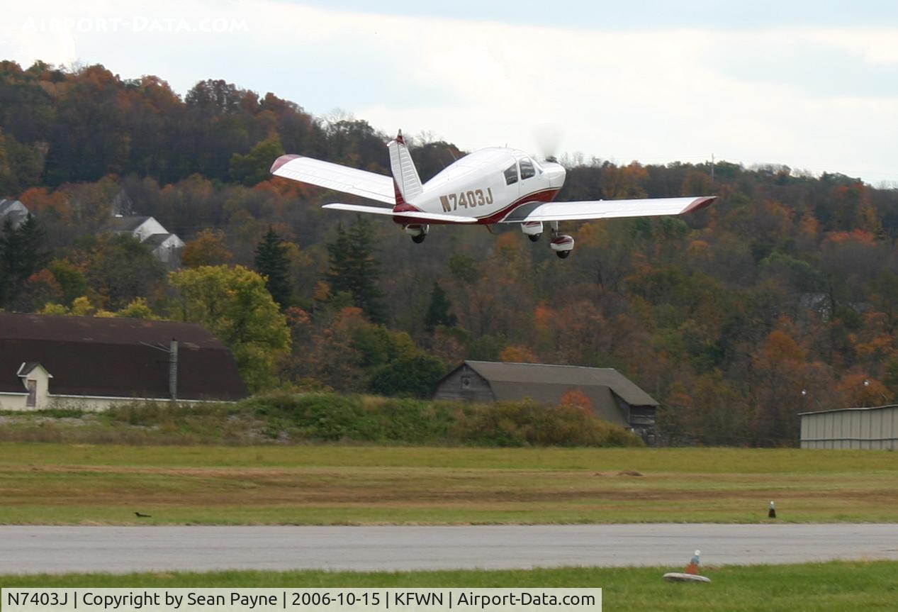 N7403J, 1969 Piper PA-28-140 C/N 28-25182, Departing Sussex (KFWN)