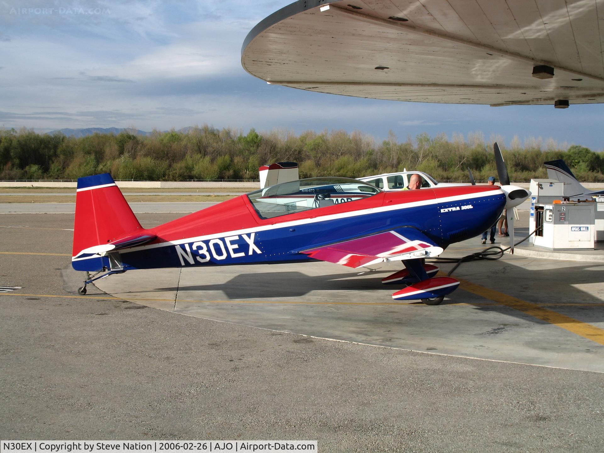 N30EX, Extra EA-300/L C/N 058, 1997 Extra Flug EA 300/L gassing up @ Corona Municipal Airport, CA