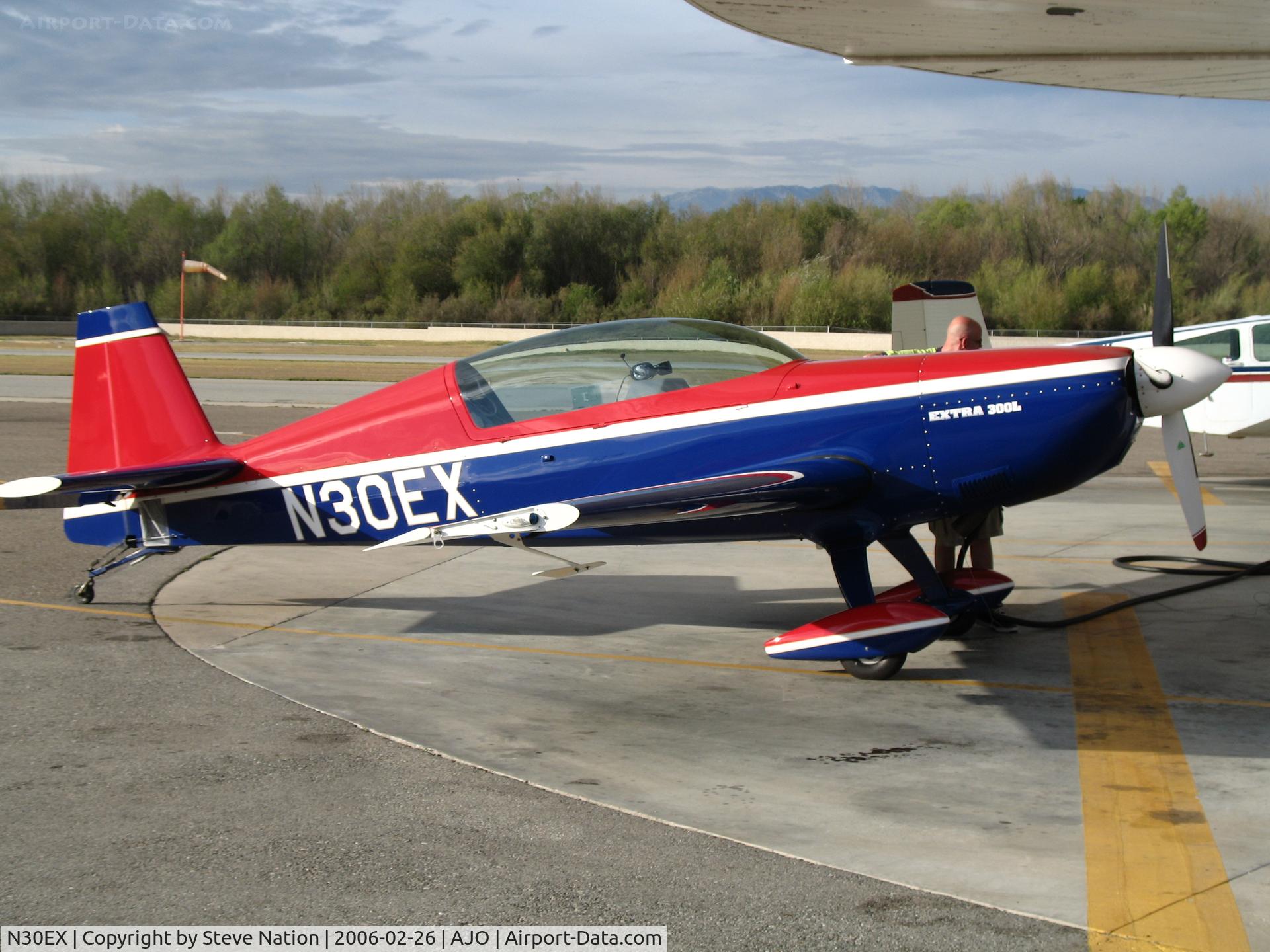 N30EX, Extra EA-300/L C/N 058, 1997 Extra Flug EA 300/L gassing up @ Corona Municipal Airport, CA