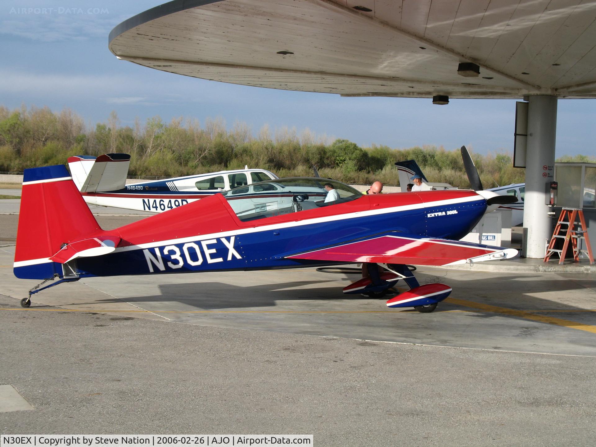 N30EX, Extra EA-300/L C/N 058, 1997 Extra Flug EA 300/L gassing up @ Corona Municipal Airport, CA