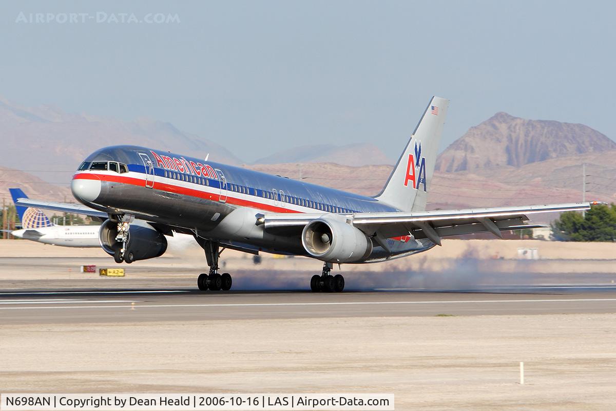 N698AN, 1994 Boeing 757-223 C/N 26980, American Airlines N698AN (FLT AAL932) from Miami Int'l (KMIA) touching down on RWY 25L.