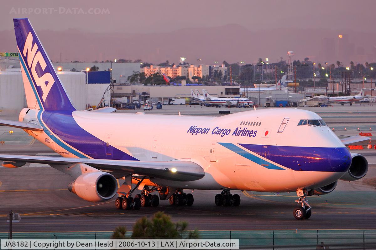 JA8182, 1987 Boeing 747-281B C/N 23813, Nippon Cargo Airlines JA8182 taxiing to the cargo terminal after arriving on RWY 25R.