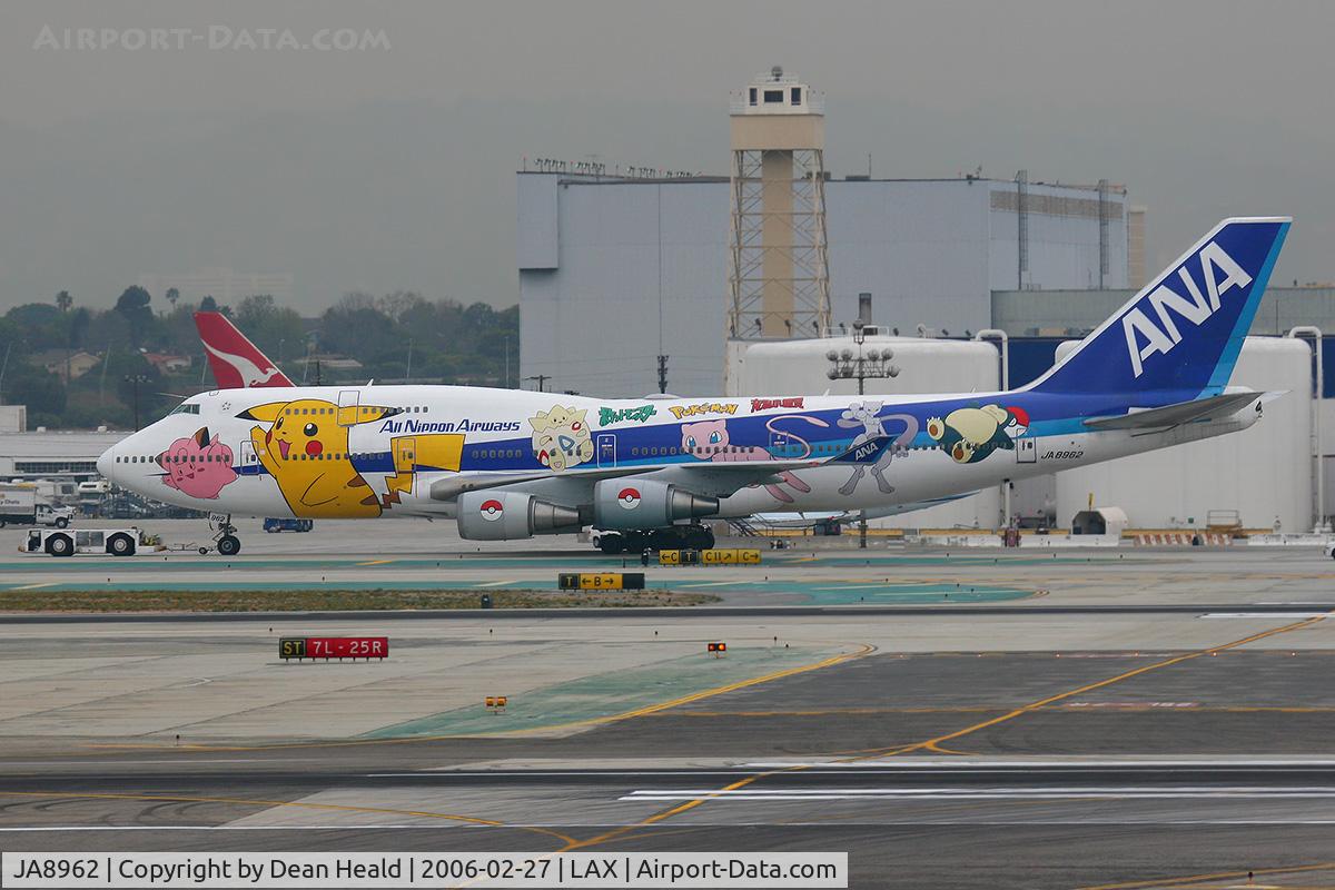 JA8962, 1993 Boeing 747-481 C/N 25645, All Nippon Airways JA8962 being towed to the remote terminals at the west end of the airport.