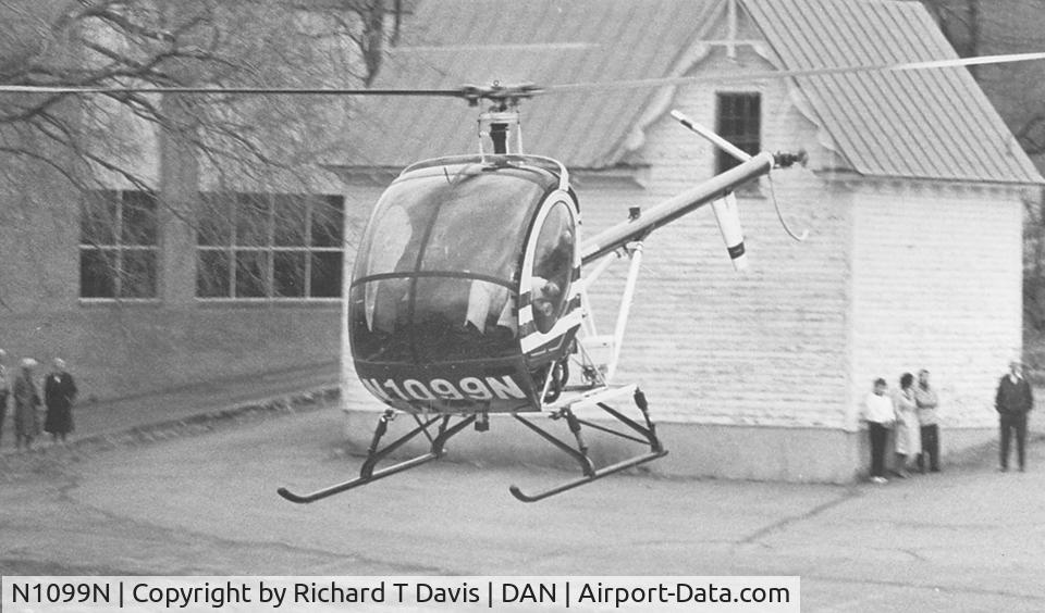 N1099N, 1980 Hughes 269C C/N 700939, 1980 Hughes 269C taking off from parking lot next to the YWCA in downtown Danville Va.in around 1993.