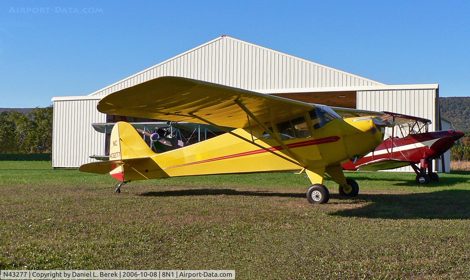 N43277, 1946 Taylorcraft BC12-D C/N 6936, I caught this lovely yellow 1946 Taylorcraft mingling with the treasures of the Golden Age Air Museum.