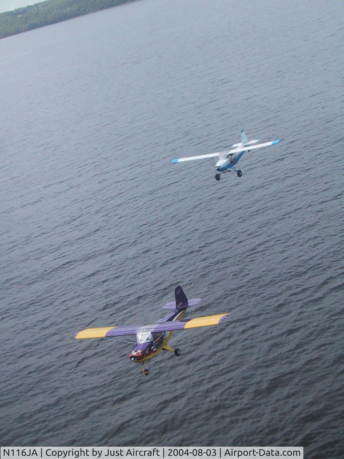 N116JA, 2003 Just Aircraft Escapade C/N JAESC0001, Just Aircraft Escapade and Highlander flying along the Door County, WI shore