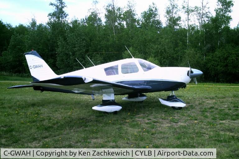 C-GWAH, 1964 Piper PA-28-180 C/N 28 1899, Recent refurb with gap seals, HID wingtip lights, flap hinge covers, wing root fairings, Speed pants and nose gear fairing and paint in 2006.
