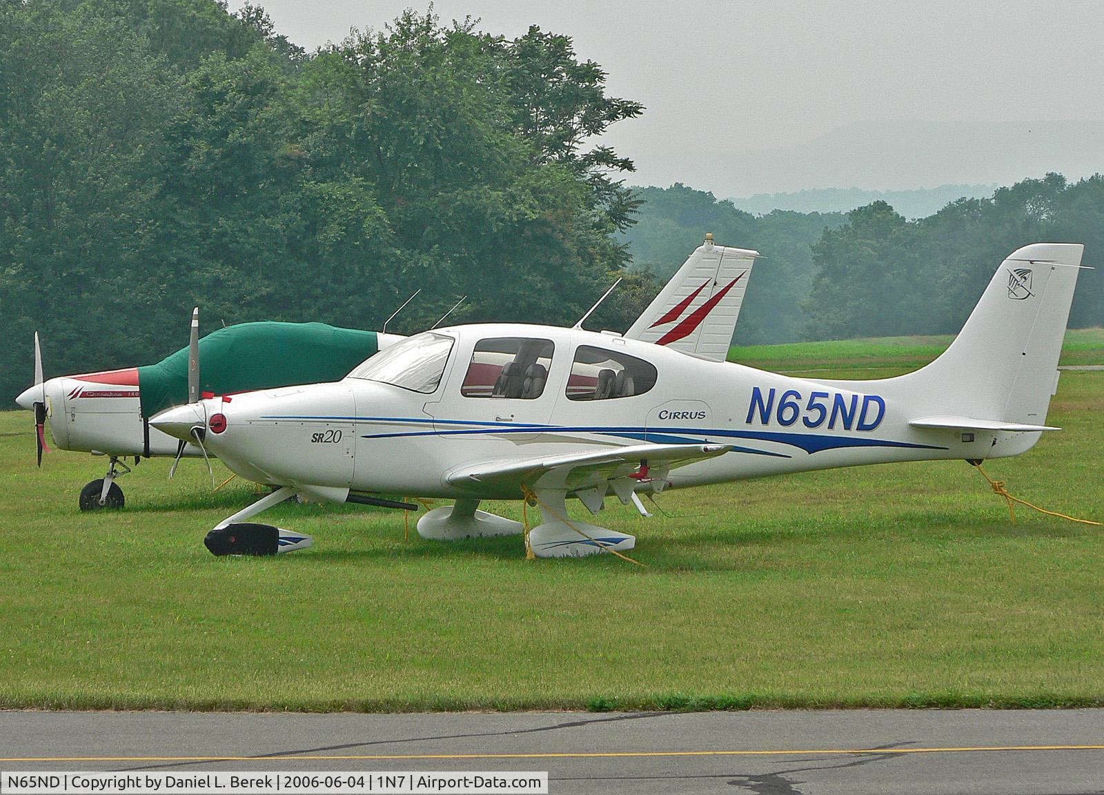 N65ND, 2004 Cirrus SR20 C/N 1390, Sleek new Cirrus takes five at Blairstown.