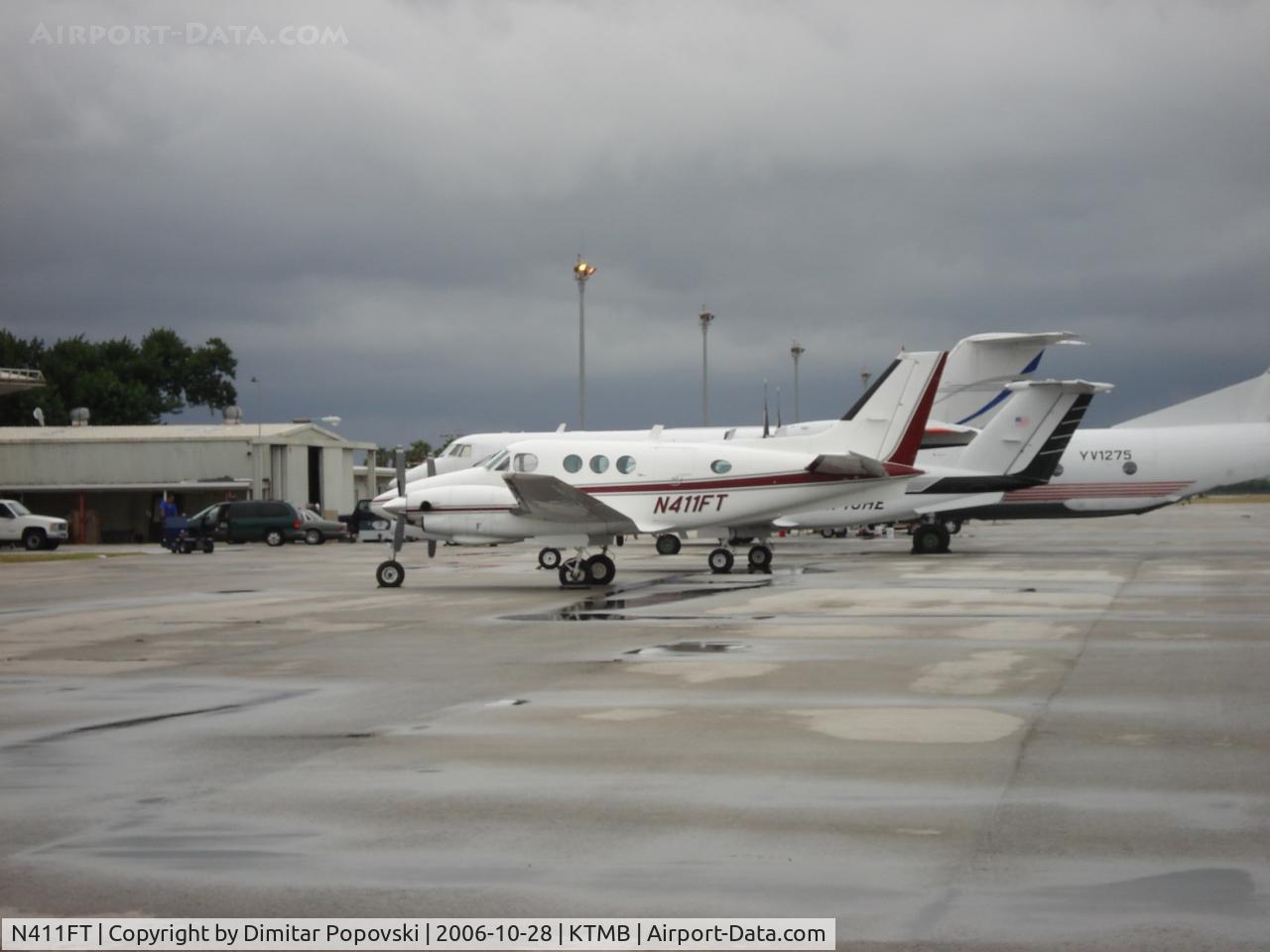 N411FT, 1969 Beech B90 C/N LJ-443, Rainy day at Tamiami