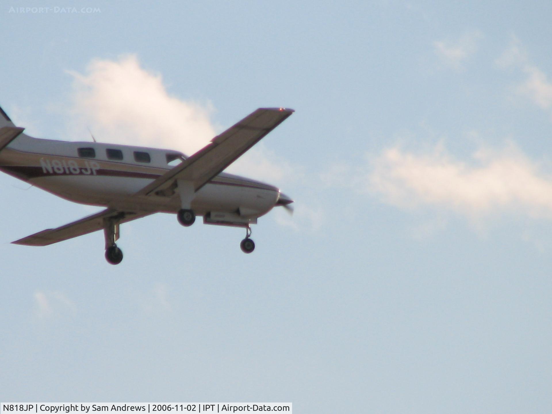 N818JP, 1984 Piper PA-46-310P Malibu C/N 46-8408047, I've been trying for OH!, such a long time to get a picture of this plane.  I had time to set up but he flew a very low pattern and was behind trees the whole time.  He has a very fast approach speed so this is the best I can do.  SO FAR!