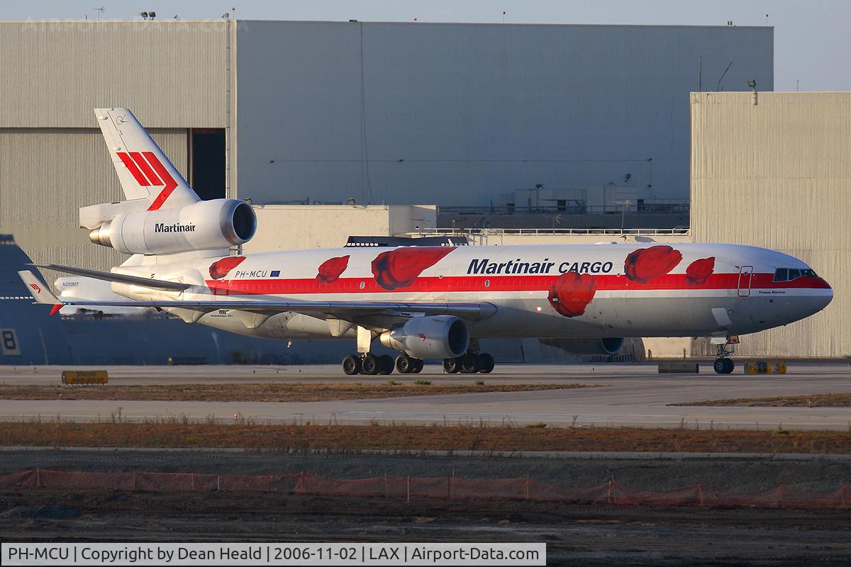PH-MCU, 1996 McDonnell Douglas MD-11F C/N 48757, Martinair Cargo taxiing to the cargo terminal after arrival on the north complex.