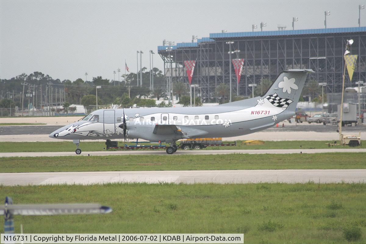 N16731, 1990 Embraer EMB-120ER Brasilia C/N 120.190, Believed to be owned by NASCAR driver Michael Waltrip, strange paint job.