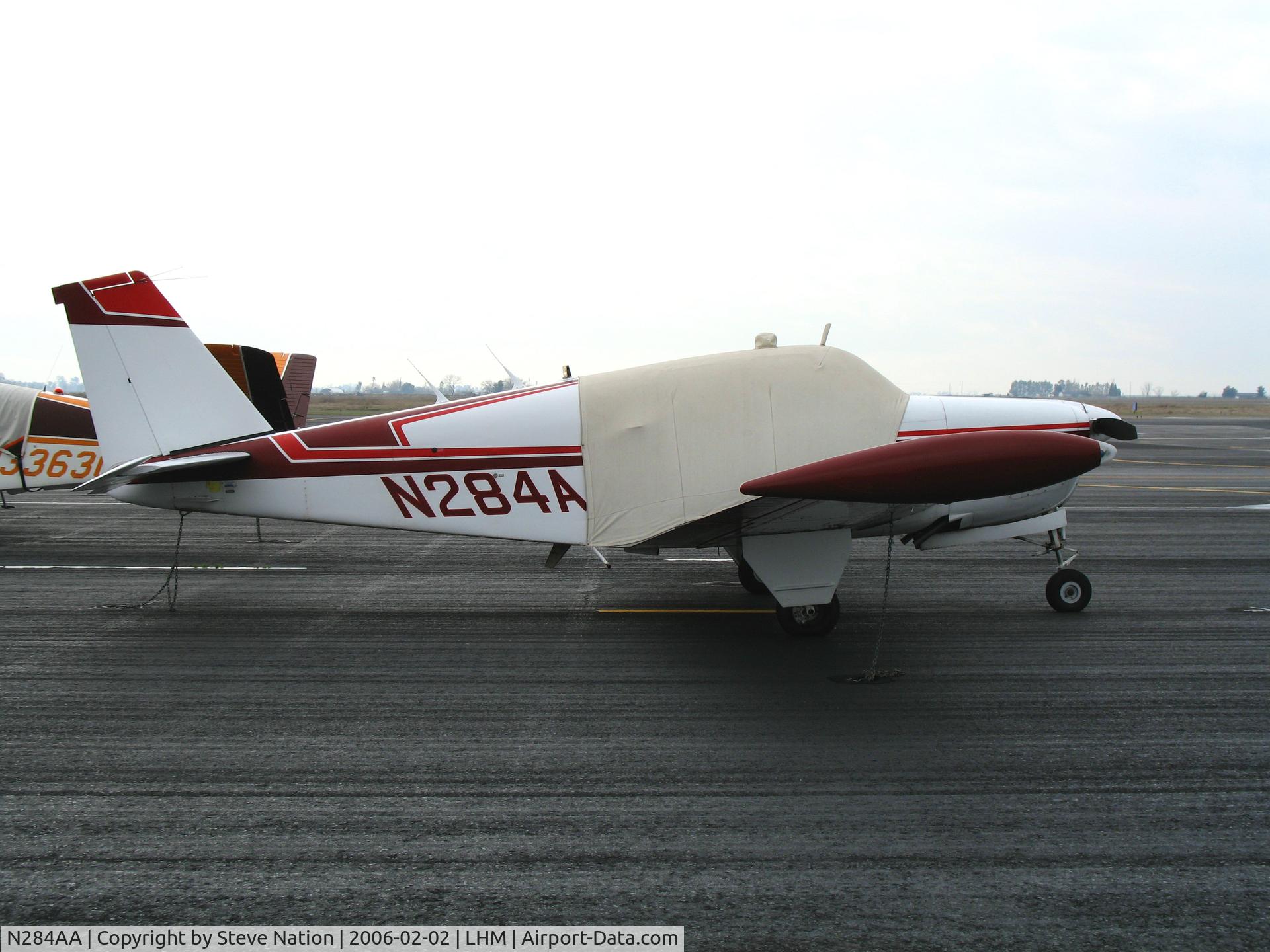 N284AA, 1960 Beech 35-33 Debonair C/N CD-189, 1960 Beech 35-33 Bonanza with cockpit covered @ Karl Harder Field/Lincoln Regional Airport, CA