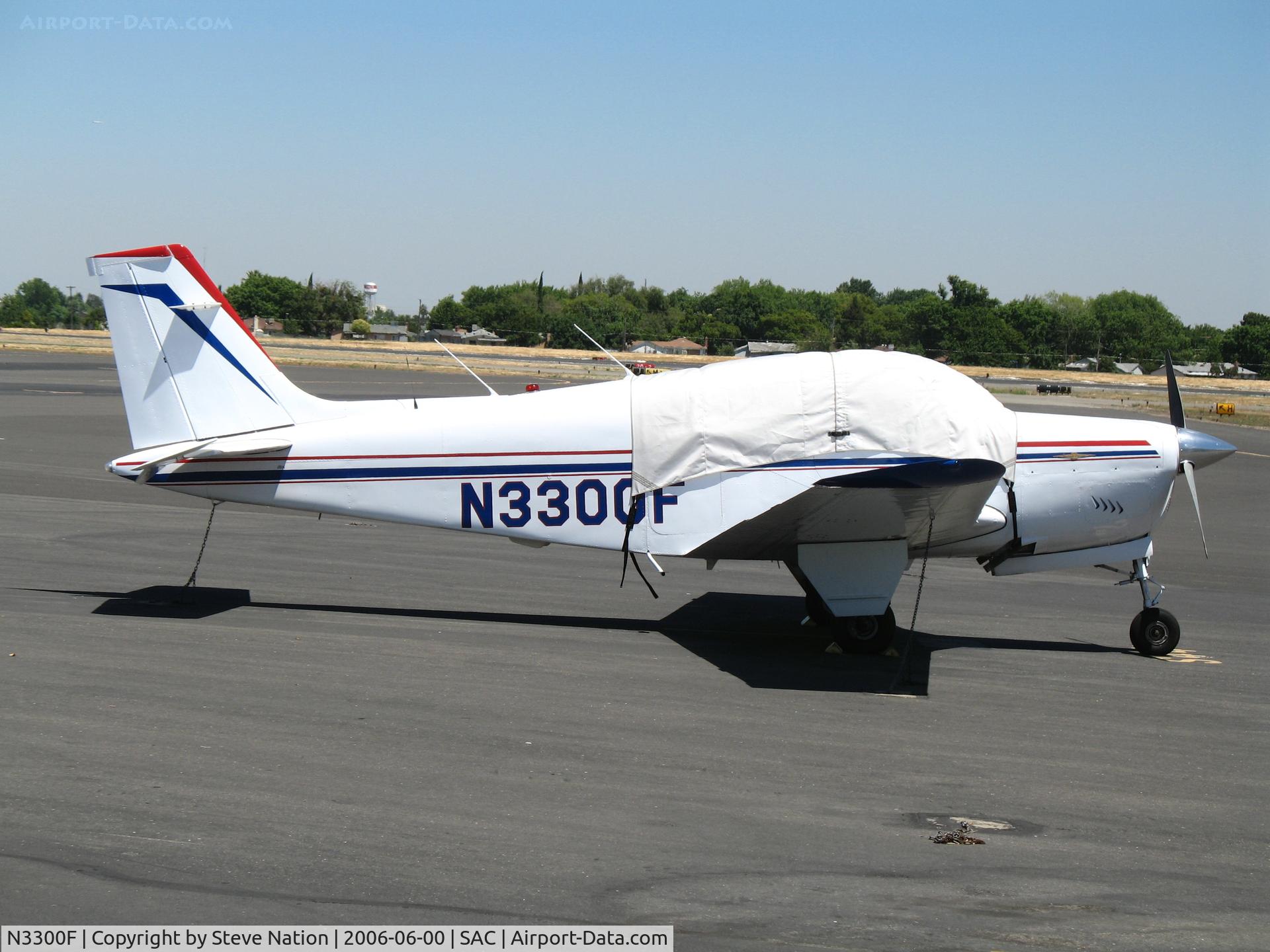 N3300F, 1962 Beech 35-B33 Debonair C/N CD-443, Carter Flygare Inc. 1962 Beech 35-B33 with cockpit covered @ Sacramento Executive Airport, CA