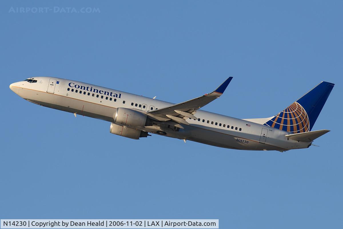N14230, 1999 Boeing 737-824 C/N 28794, Continental Airlines N14230 (FLT COA1503) climbing out from RWY 25R enroute to Newark/New York Liberty Int'l (KEWR).