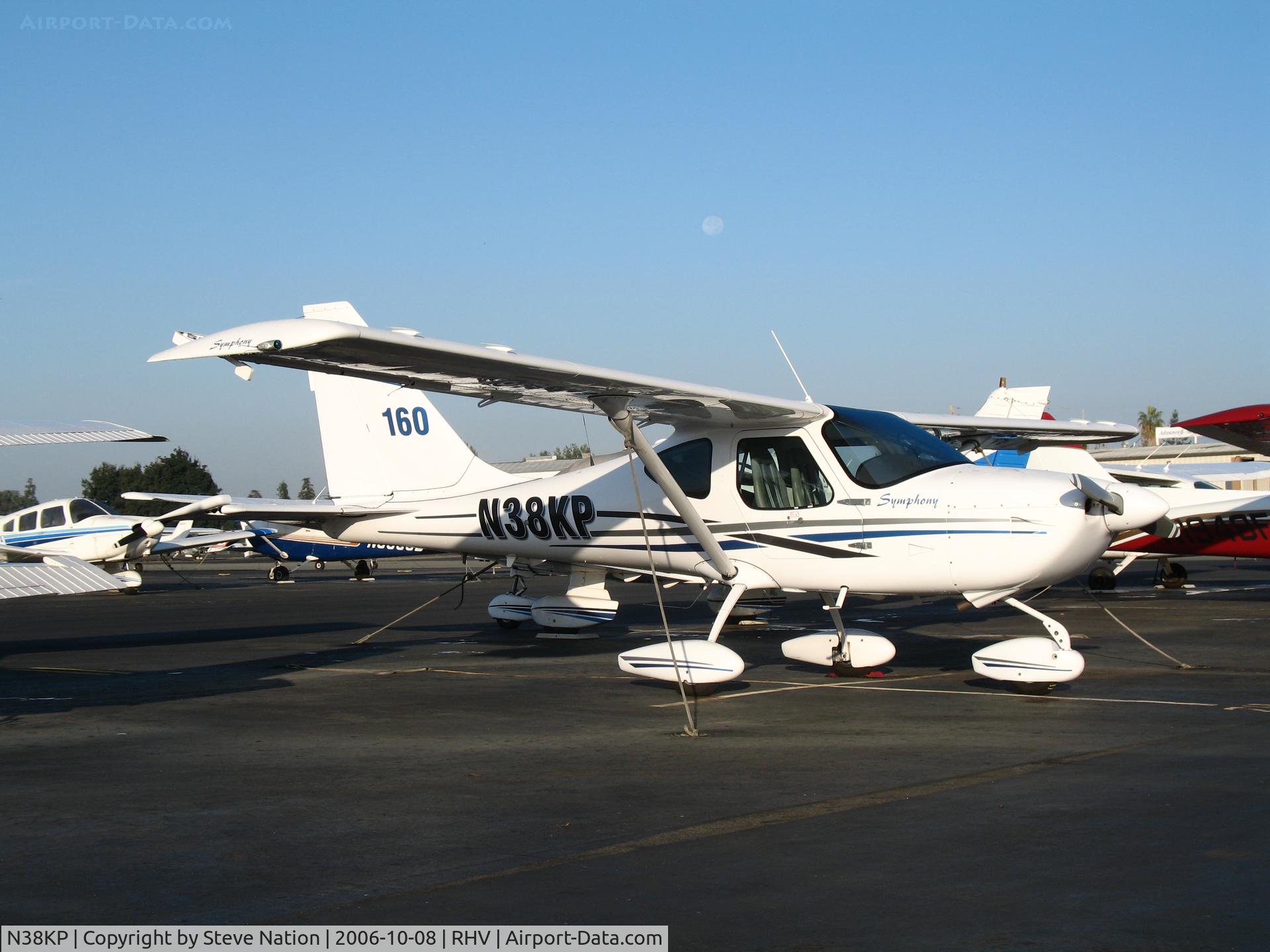 N38KP, 2006 Symphony SA-160 C/N S-0014, Pramhus Aviation 2006 Symphony Aircraft SA-160 with full moon setting @ Reid-Hillview Airport (San Jose), CA