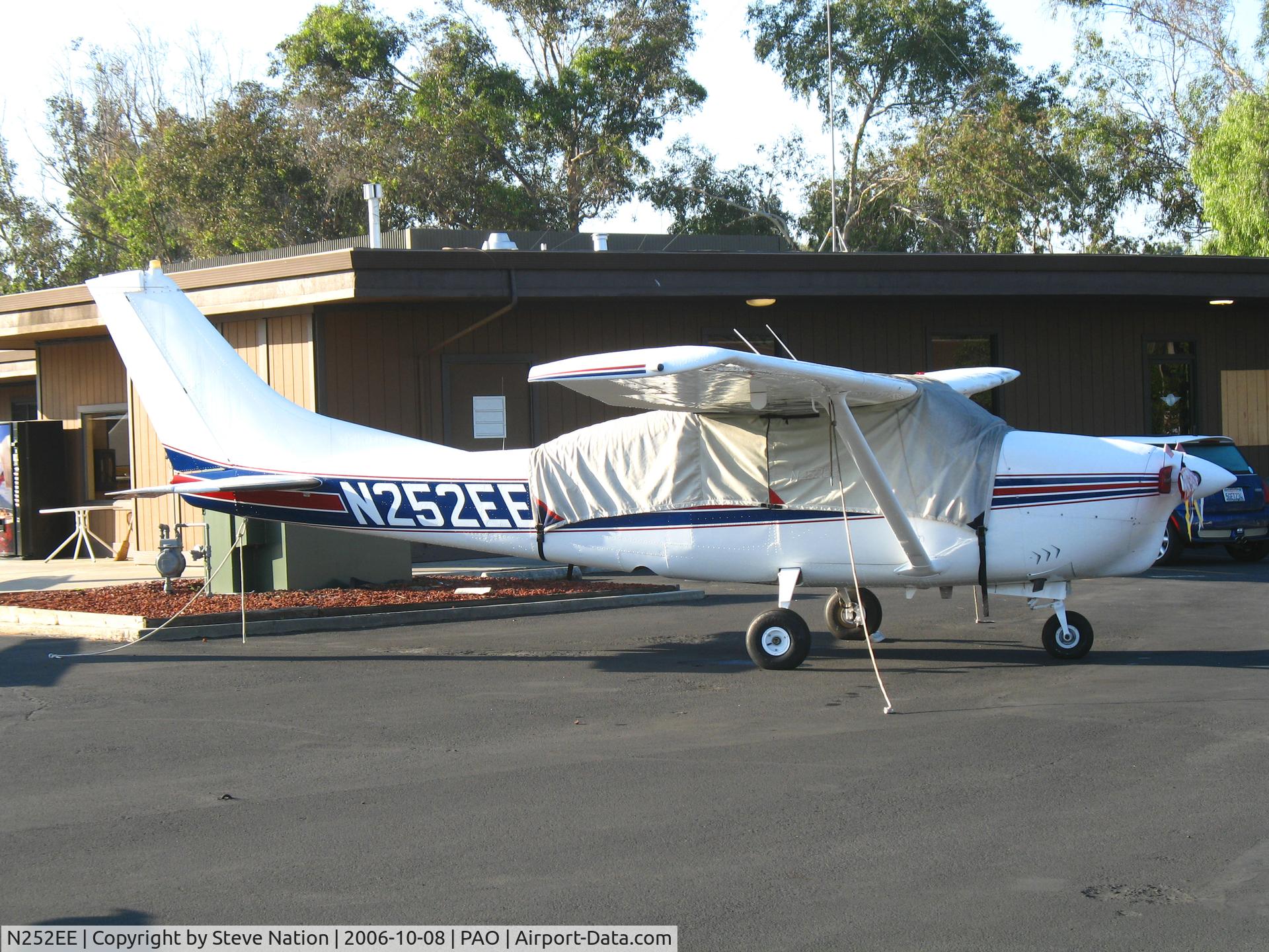 N252EE, 1964 Cessna 210E Centurion C/N 21058526, 1964 Cessna 210E with cockpit covered @ Palo Alto Airport, CA