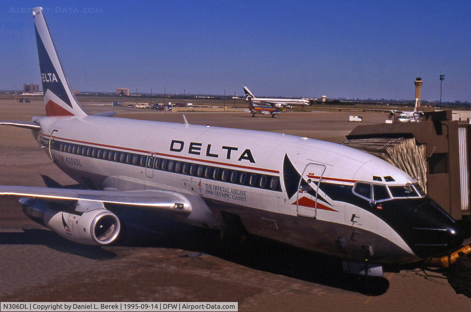 N306DL, 1983 Boeing 737-232 C/N 23078, Seen in 1995 at DFW, this 737 was already sporting stickers commemorating the 1996 Summer Olympics in Atlanta. This workhorse would serve the airline faithfully another 10 years, until early 2005.