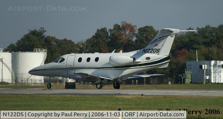 N122DS, Raytheon Aircraft Company 390 C/N RB-100, Tearing down Runway Five, headed for MGW