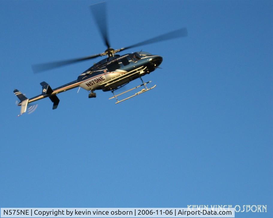 N575NE, 2005 Bell 407 C/N 53670, on patrol over GI during pres. Bush visit