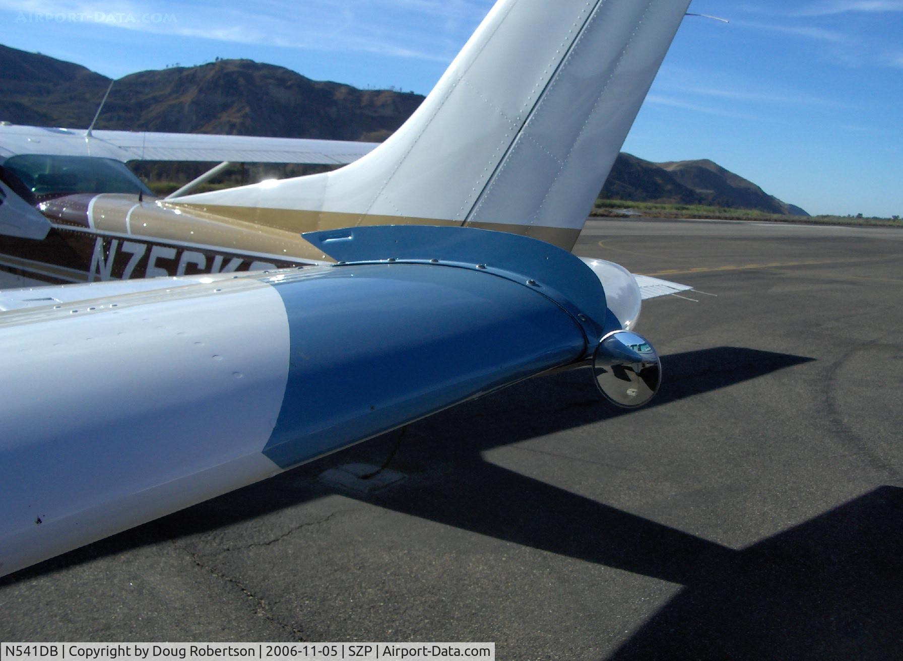 N541DB, 1964 Beech S35 Bonanza C/N D-7333, 1964 Beech S35 BONANZA, Continental IO-520-B 285 Hp, closeup of convex gear status mirror, one each wing near tip