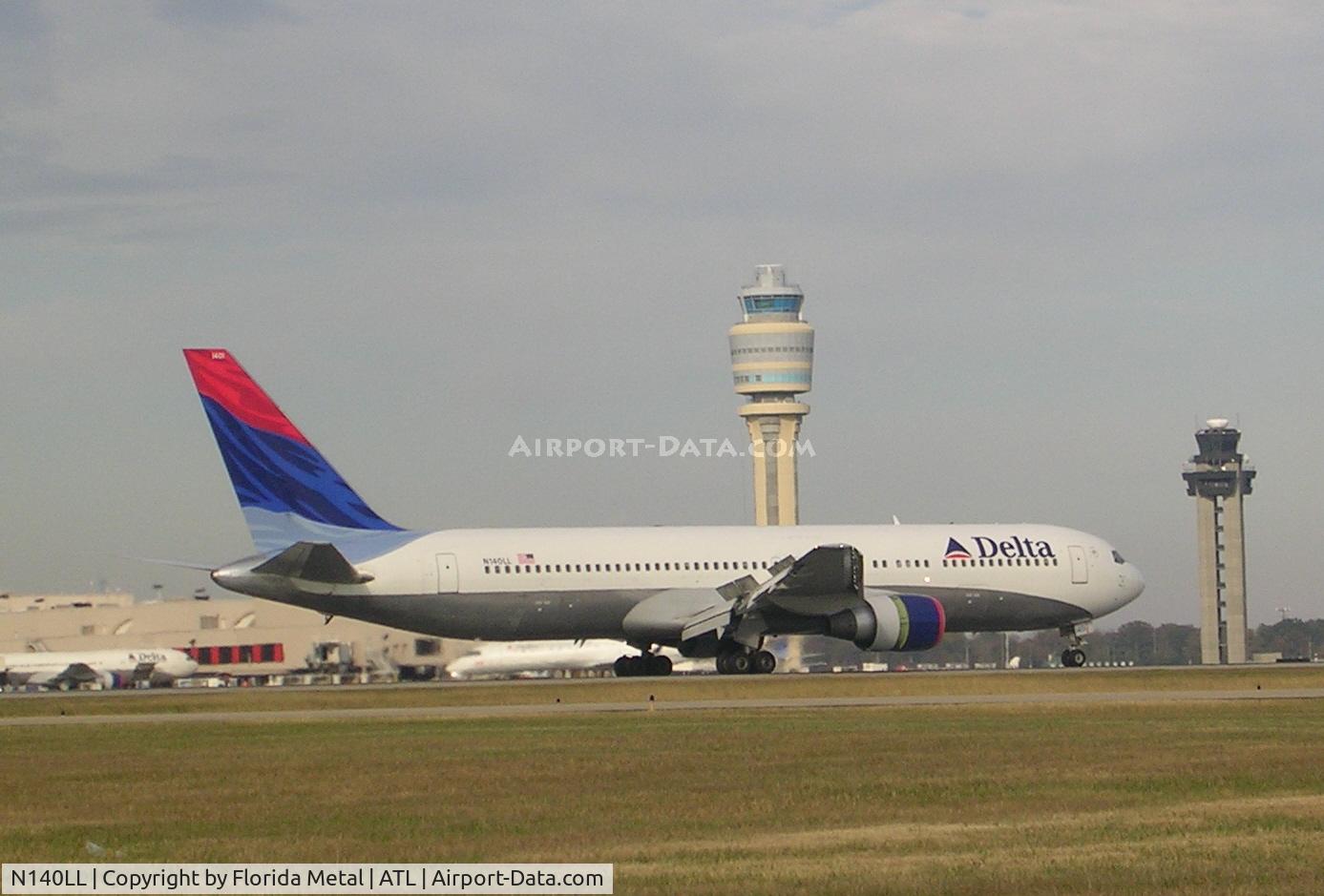 N140LL, 1993 Boeing 767-332 C/N 25988, In front of towers