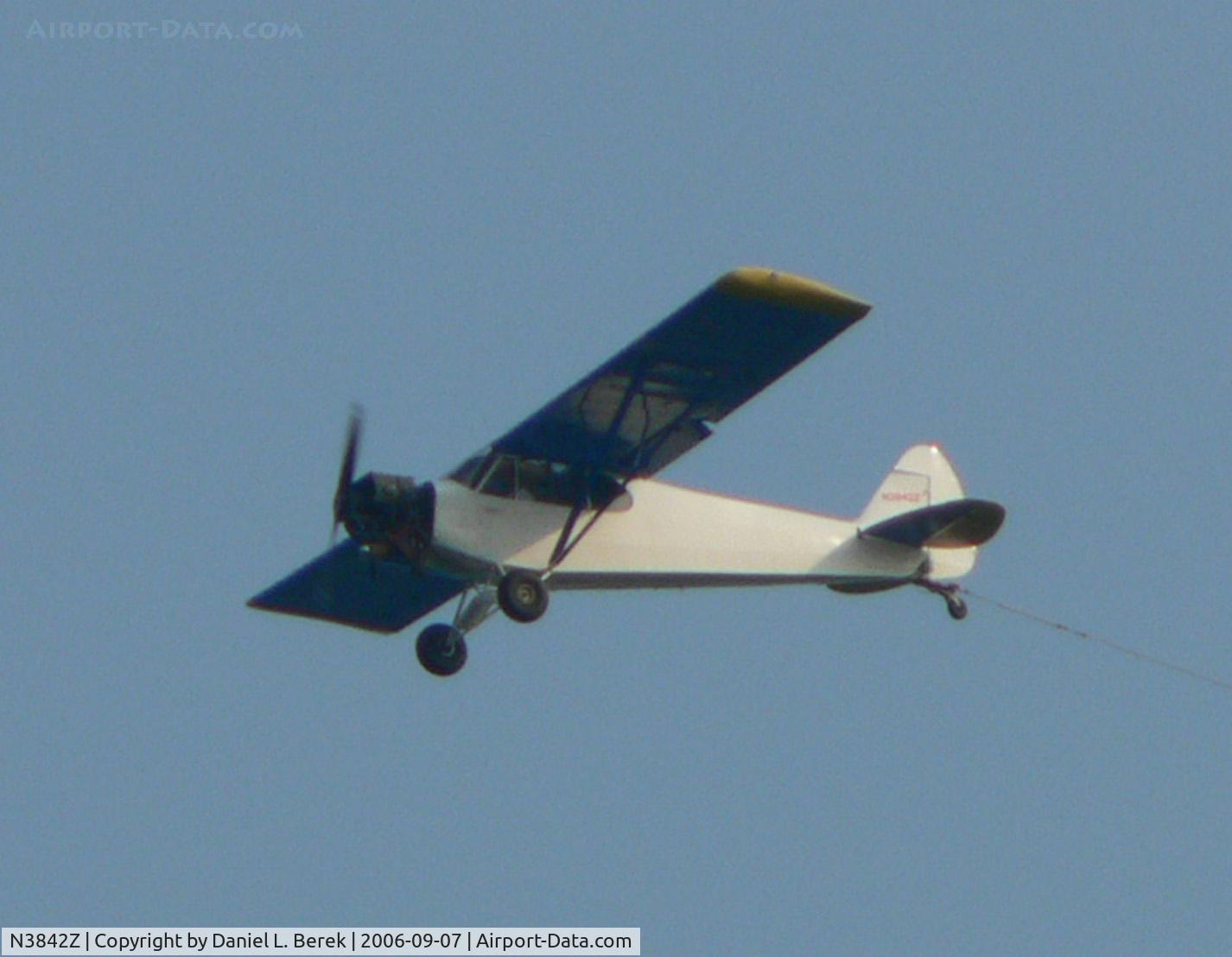 N3842Z, 1961 Piper PA-18-150 Super Cub C/N 18-7596, Some people are more attracted to the airplane than to the banner!