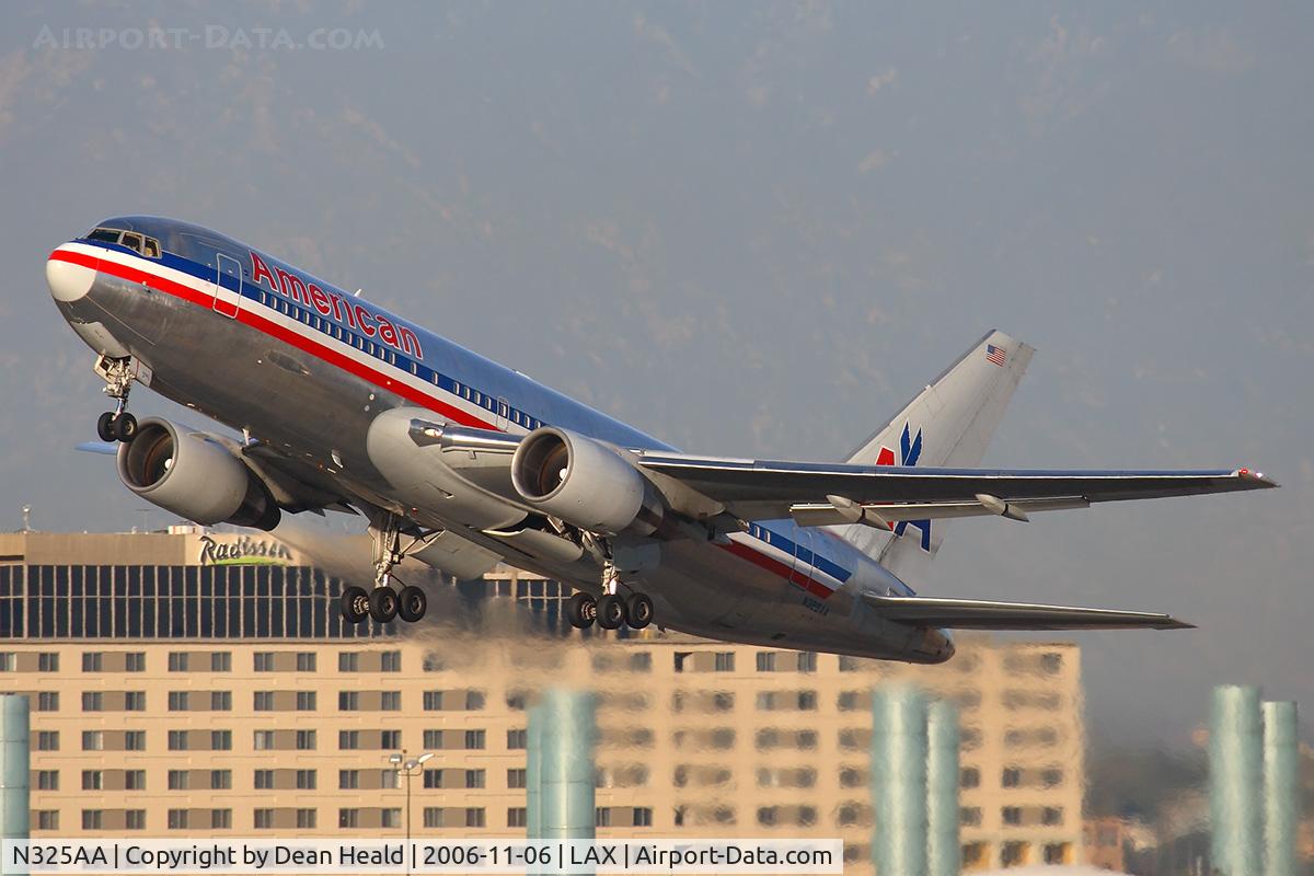 N325AA, 1986 Boeing 767-223 C/N 22326, American Airlines N325AA (FLT AAL242) climbing out from RWY 25R enroute to John F Kennedy Int'l (KJFK).
