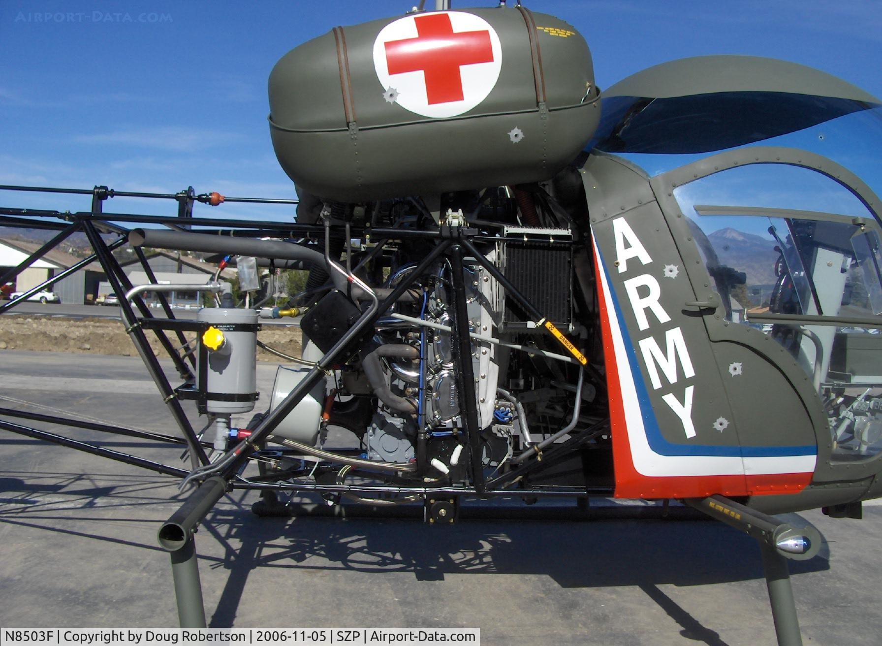 N8503F, 1965 Bell 47G-4 C/N 3350, 1965 Bell 47G-4, Lycoming VO-540 305 Hp engine closeup, more 'combat damage' fake bullet holes but no fuel tank leaks!