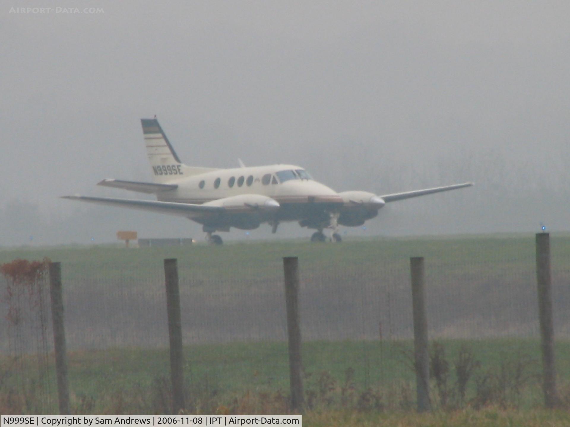 N999SE, Beech E-90 King Air C/N LW-344, Waiting for inbound Learjet traffic prior to takeoff going to Teterboro on a nice IFR day.