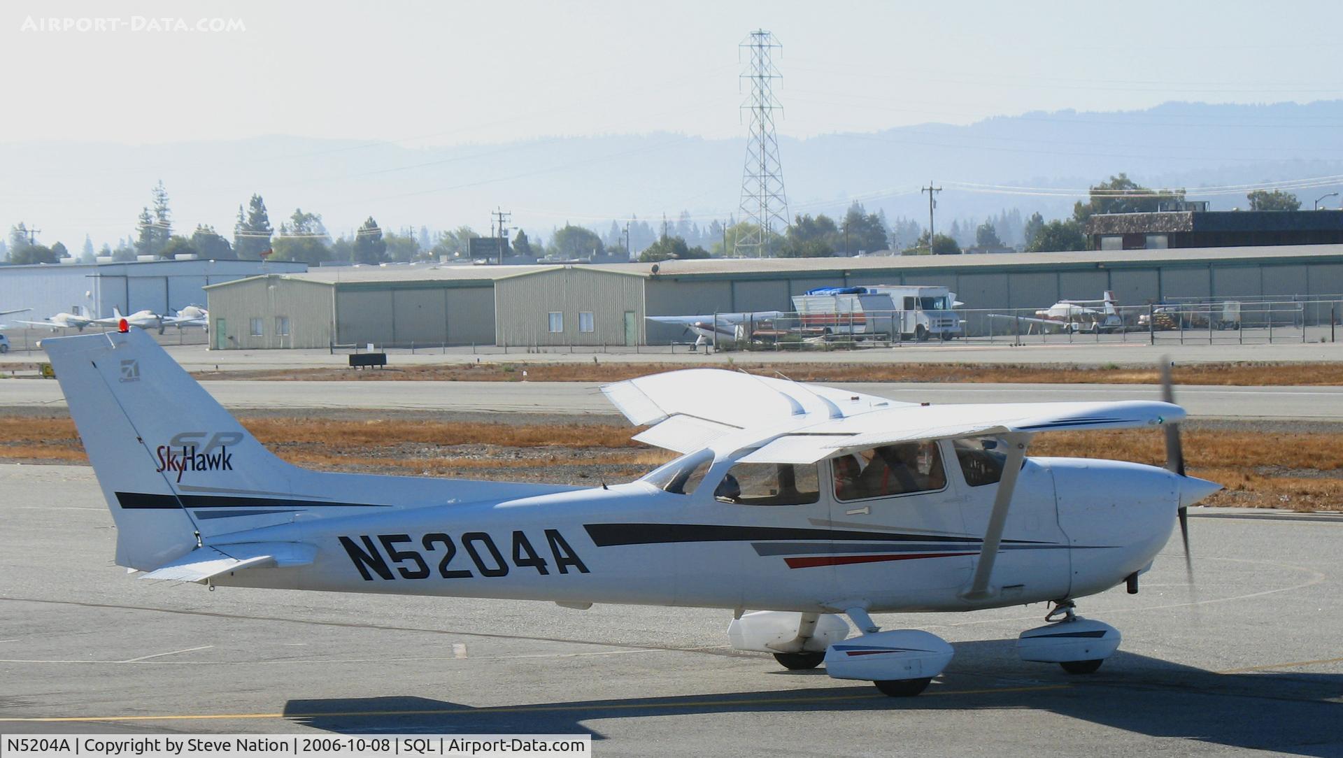 N5204A, 2002 Cessna 172S C/N 172S9101, Looking Up LLC 2002 Cessna 172S taxying out for take-off @ San Carlos Airport, CA