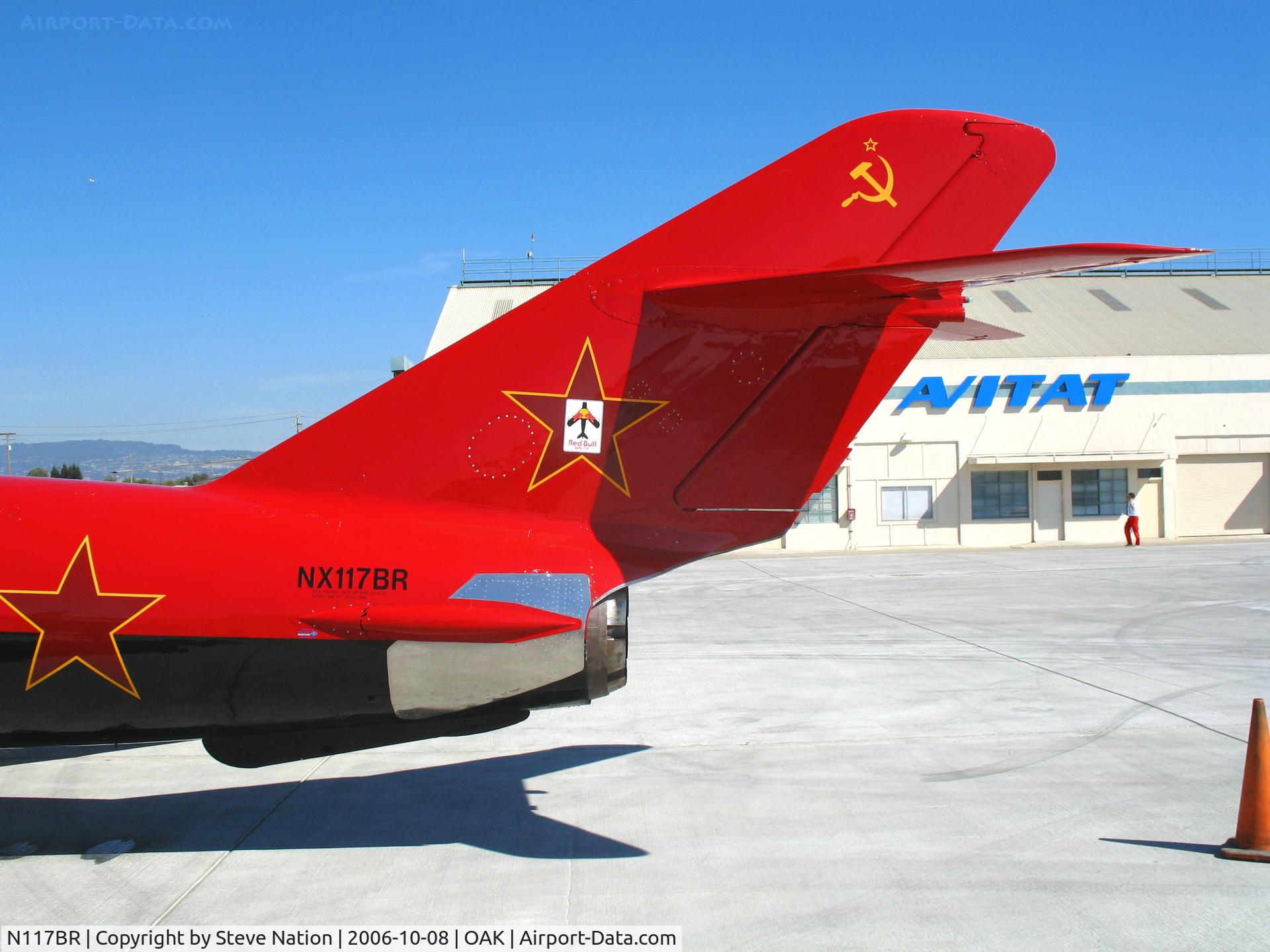 N117BR, 1959 PZL-Mielec Lim-5 (MiG-17F) C/N 1C1529, Tail close-up shot of bright red Mig Magic Inc. LIM-5 as NX117BR at Fleet Week air show @ Oakland International Airport, CA